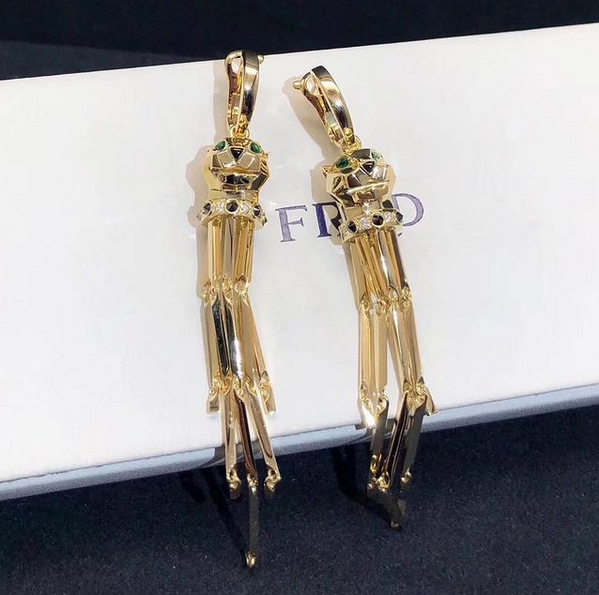 Panthere de Cartier earrings 18k yellow gold with diamonds,emeralds, onyx